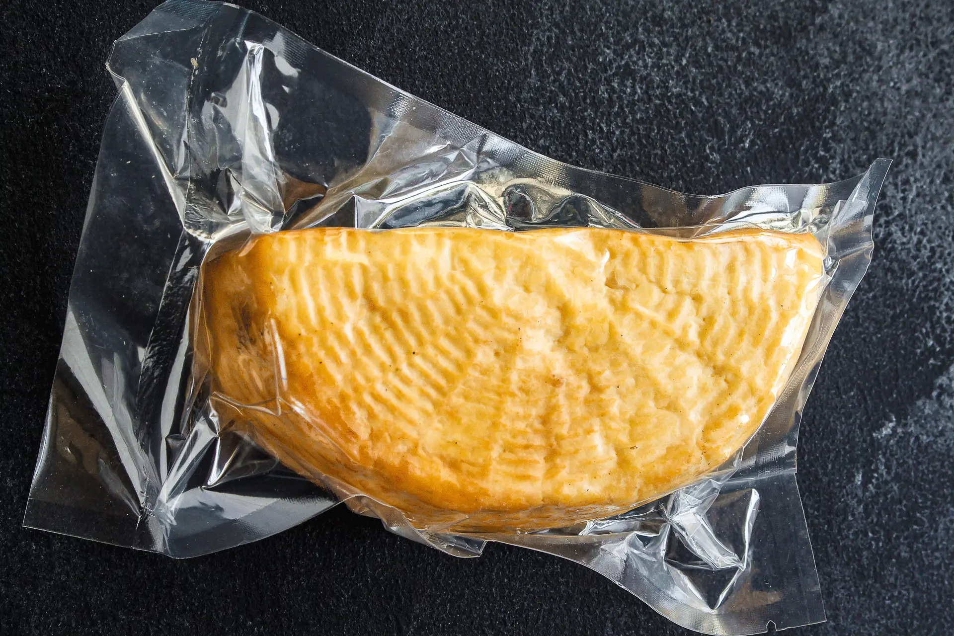 Smoked fish or smoked cheese sealed in foil
